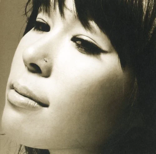 声が低い女性におすすめのカラオケソング10位 AI/Story